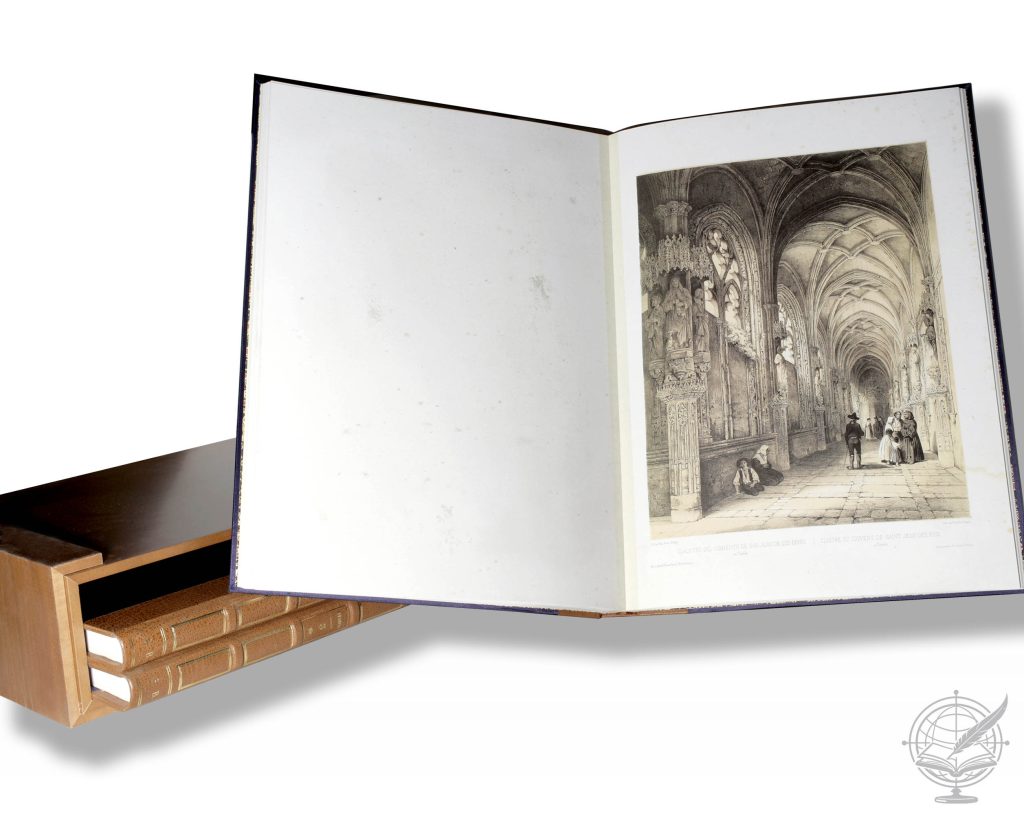 Composition showing an open facsimile volume of the España Artística y Monumental (Biblioteca del Casino de Bilbao), bound in three volumes in Dutch leather bound in a wooden pouch slipcase.